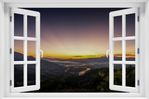 Fototapeta Naklejka Na Ścianę Okno 3D - Mountain view misty morning above Kok river and Tha Ton City around with sea of mist and purple sky background, sunrise at Wat Tha Ton, Tha Ton District, Fang, Chiang Mai, northern of Thailand.