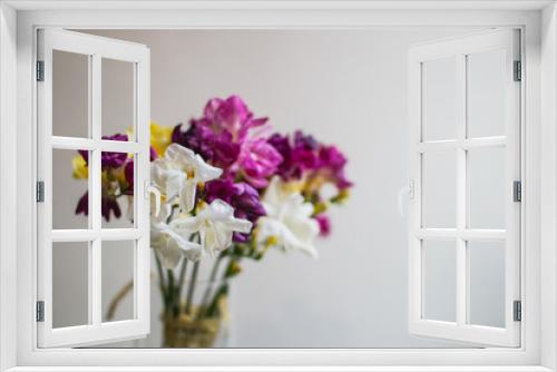 Fototapeta Naklejka Na Ścianę Okno 3D - beautiful multi-colored alstroemeria bouquet in a glass vase