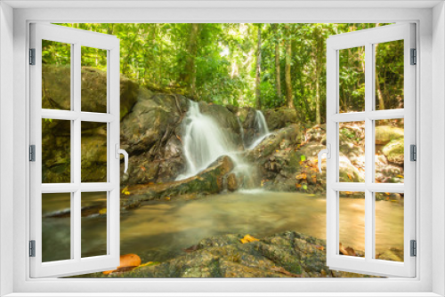 Fototapeta Naklejka Na Ścianę Okno 3D - Kathu Waterfall in the tropical forest area In Asia, suitable for walks, nature walks and hiking, adventure photography Of the national park Phuket Thailand,Suitable for travel and leisure.