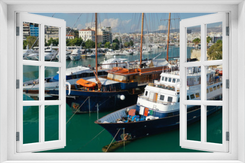 Fototapeta Naklejka Na Ścianę Okno 3D - Aerial drone bird's eye top view photo of luxury yacht with wooden deck docked in deep blue waters, Cyclades, Greece