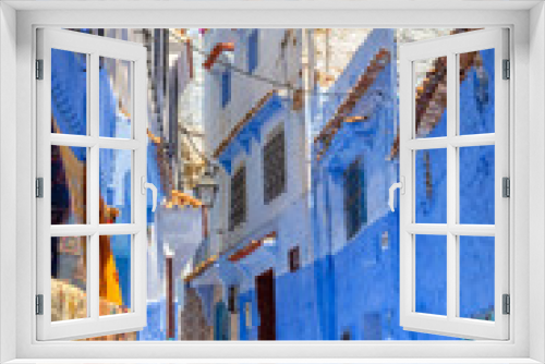 Fototapeta Naklejka Na Ścianę Okno 3D - Street in the blue city of Chefchaouen in Morocco