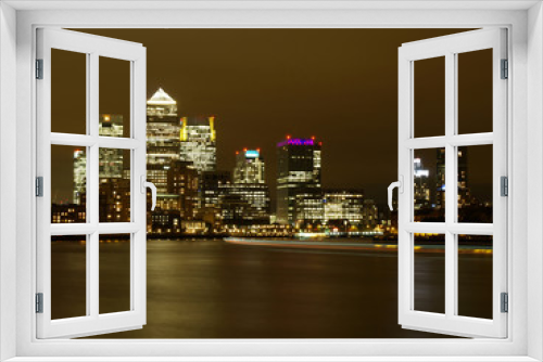Fototapeta Naklejka Na Ścianę Okno 3D - Nightscene of the office buildings at Canary Wharf.