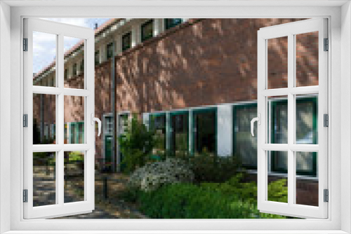 Fototapeta Naklejka Na Ścianę Okno 3D - Renovations. Modern Dutch architecture. Houses. Residential housing. Netherlands. Style Amsterdam School.