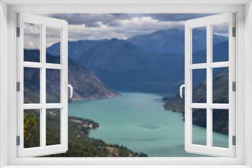 Fototapeta Naklejka Na Ścianę Okno 3D - Beautiful View from Above of Seton Lake surrounded by Canadian Mountain Landscape during a summer day. Taken in Shalalth near Lillooet, BC, Canada.