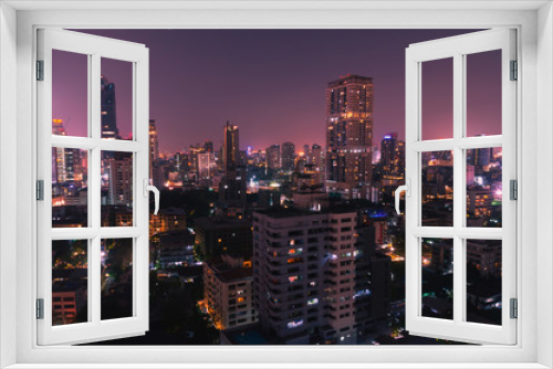 Fototapeta Naklejka Na Ścianę Okno 3D - Bangkok night view with skyscraper in business district in Bangkok Thailand
