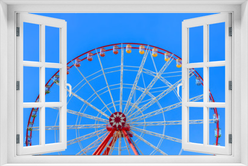 Fototapeta Naklejka Na Ścianę Okno 3D - Big ferris wheel against the blue sky