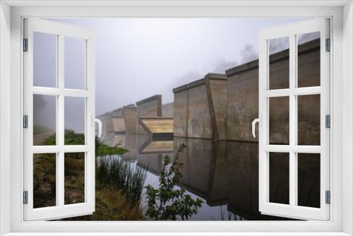Fototapeta Naklejka Na Ścianę Okno 3D - Concrete wall with reflection