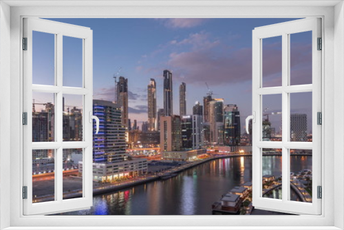 Fototapeta Naklejka Na Ścianę Okno 3D - Dubai skyline at sunset aerial timelapse