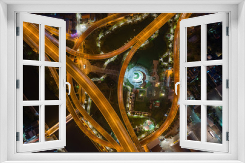 Fototapeta Naklejka Na Ścianę Okno 3D - Aerial view of Bhumibol suspension bridge cross over Chao Phraya River in Bangkok city with car on the bridge at sunset sky and clouds in Bangkok Thailand.