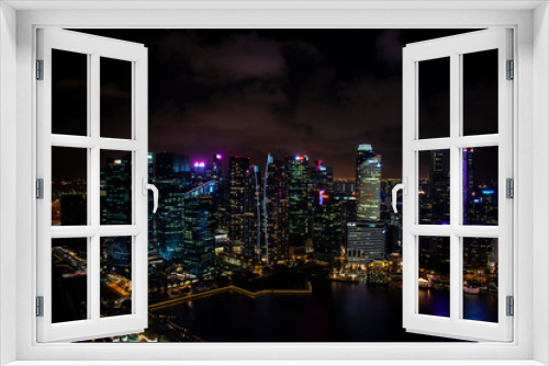Fototapeta Naklejka Na Ścianę Okno 3D - Singapore, 7 january 2019 - The Singapore skyline at night