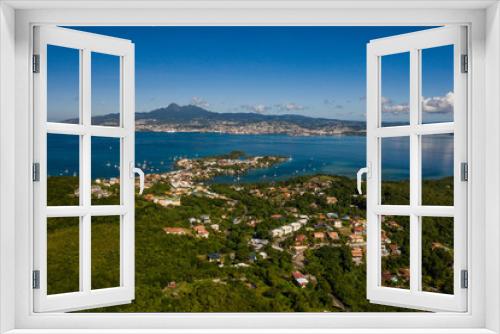 Fototapeta Naklejka Na Ścianę Okno 3D - Vue aérienne de la Pointe du Bout, en Martinique, par très beau temps, avec la baie de Fort de France en arrière plan