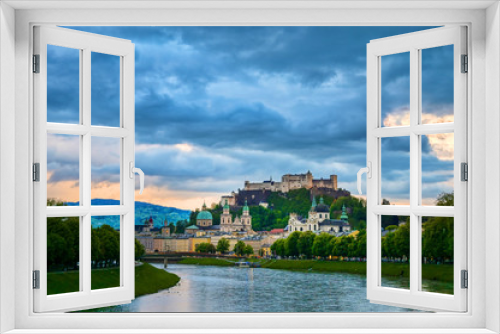 Fototapeta Naklejka Na Ścianę Okno 3D - A view of the Austrian city of Salzburg along the Salzach River.