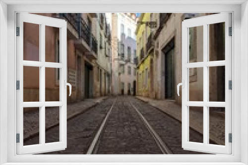 Fototapeta Naklejka Na Ścianę Okno 3D - narrow street in old town of lisbon portugal Europe
