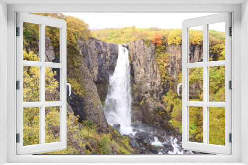 Fototapeta Naklejka Na Ścianę Okno 3D - アイスランドの滝スカフタフェットル