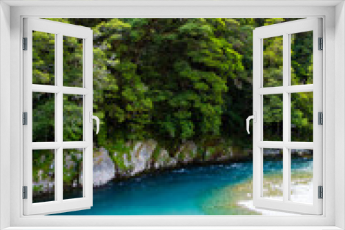 Fototapeta Naklejka Na Ścianę Okno 3D - Blue river water and green forest