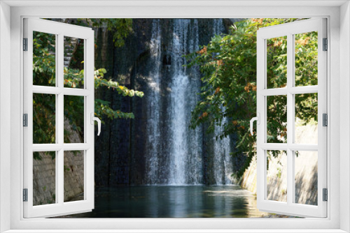 Fototapeta Naklejka Na Ścianę Okno 3D - city ​​waterfall on a sunny day