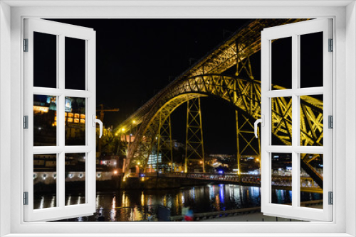 Fototapeta Naklejka Na Ścianę Okno 3D - Night view of the Dom Luis I bridge from the ribeira dock