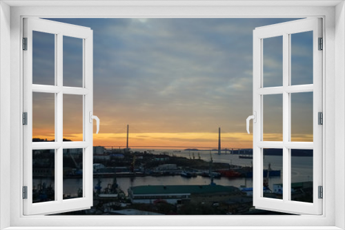 Fototapeta Naklejka Na Ścianę Okno 3D - Cityscape with view of the sunrise. Vladivostok