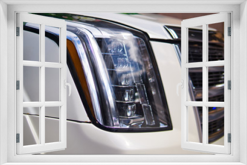 Fototapeta Naklejka Na Ścianę Okno 3D - Closeup of new projector headlight on the modern car.
