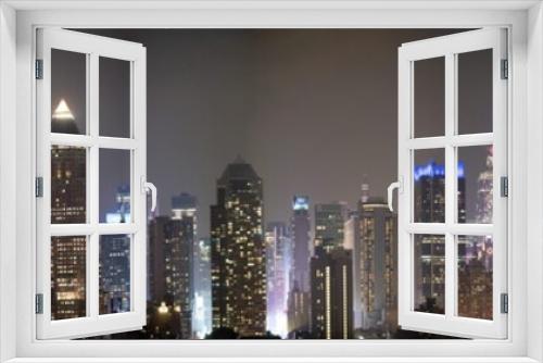 Fototapeta Naklejka Na Ścianę Okno 3D - Panoramic night skyline of Midtown Manhattan at night, New York City, USA