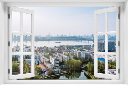 Fototapeta Naklejka Na Ścianę Okno 3D - The skyline along the Yangtze River in Wuhan, Hubei, China