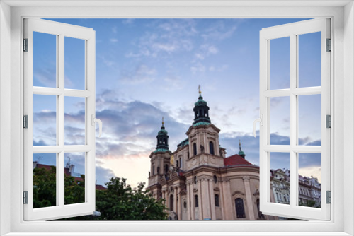 Fototapeta Naklejka Na Ścianę Okno 3D - The St. Nicholas Church and the streets of Prague, Czech Republic.