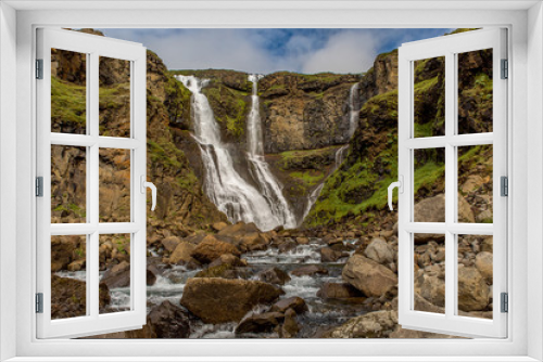 Fototapeta Naklejka Na Ścianę Okno 3D - View of a triple waterfall with cascades of a mountain river in the foreground