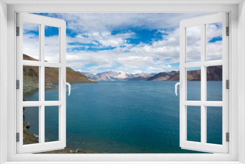Fototapeta Naklejka Na Ścianę Okno 3D - Ladakh, India - Aug 07 2019 - Pangong Lake view from Between Merak and Maan in Ladakh, Jammu and Kashmir, India. The Lake is an endorheic lake in the Himalayas situated at a height of about 4350m.