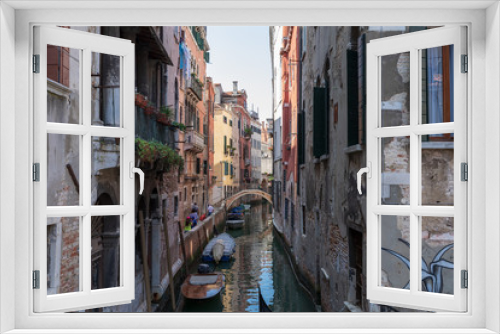 Fototapeta Naklejka Na Ścianę Okno 3D - Panoramic view of Venice narrow canal with historical buildings and boat