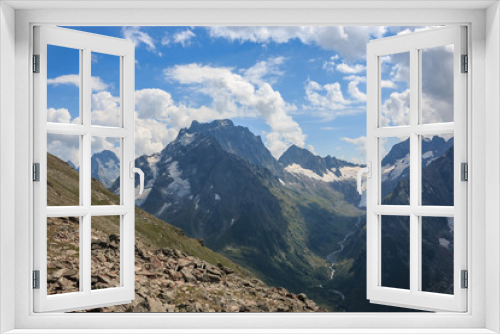 Fototapeta Naklejka Na Ścianę Okno 3D - Panorama of mountains scene with dramatic blue sky in national park of Dombay