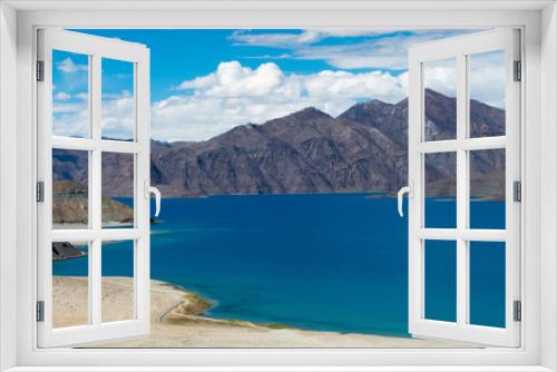 Fototapeta Naklejka Na Ścianę Okno 3D - Ladakh, India - Aug 06 2019 - Pangong Lake view from Merak Village in Ladakh, Jammu and Kashmir, India. The Lake is an endorheic lake in the Himalayas situated at a height of about 4350m.