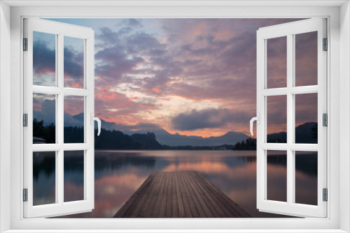 Fototapeta Naklejka Na Ścianę Okno 3D - Bled Lake pier at sunrise
