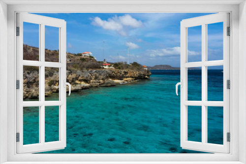 Fototapeta Naklejka Na Ścianę Okno 3D - Aerial view of coast of Curaçao in the Caribbean Sea with turquoise water, cliff, beach and beautiful coral reef around St.Martha Bay