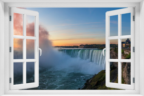 Fototapeta Naklejka Na Ścianę Okno 3D - Niagara Falls is a group of three waterfalls at the southern end of Niagara Gorge, between the Canadian province of Ontario and the US state of New York