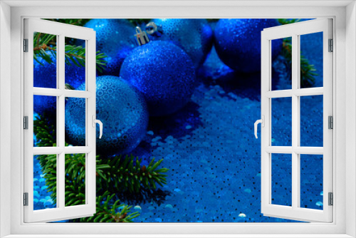 Fototapeta Naklejka Na Ścianę Okno 3D - blue shiny christmas toys / decoration balls on a sparkling blue sequin background. Christmas New Year background with place for text.
