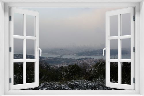 Fototapeta Naklejka Na Ścianę Okno 3D - Istanbul in a fog in winter, view from the highest point of the city