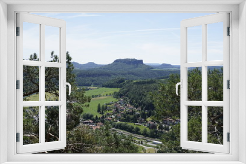 Fototapeta Naklejka Na Ścianę Okno 3D - View over Kurort Rathen and different mountains in Saxon Switzerland