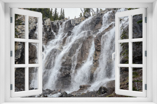 Fototapeta Naklejka Na Ścianę Okno 3D - Multiple cascades of wide Tangle Falls in Jasper National Park, Alberta, Canada