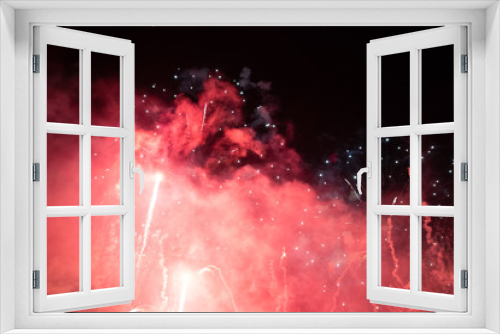 Fototapeta Naklejka Na Ścianę Okno 3D - Celebrating New Year with fireworks