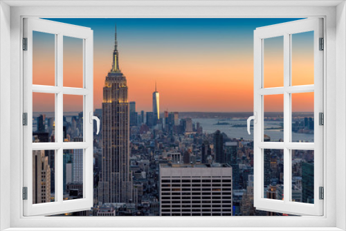 Fototapeta Naklejka Na Ścianę Okno 3D - New York City skyline at sunset	