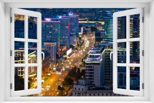 Fototapeta Naklejka Na Ścianę Okno 3D - Moscow. Russia. Multi-lane road. Night Moscow view from above. Cars rides through the evening city. Road architecture of Russia. Lights of the night city. Russia region. Tour Russian Federation