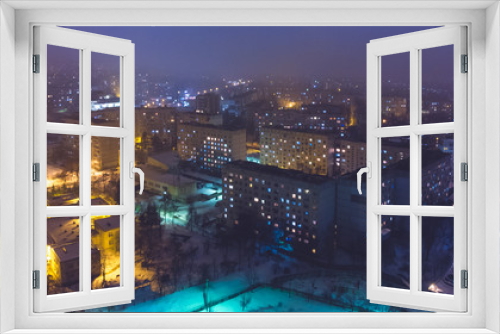 Fototapeta Naklejka Na Ścianę Okno 3D - The city Chisinau in winter, at night with lights. Aerial view