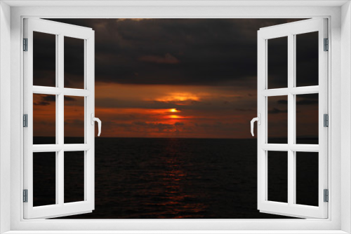 Fototapeta Naklejka Na Ścianę Okno 3D - Sunset at sea in the Manuel Antonio National Park. Costa Rica