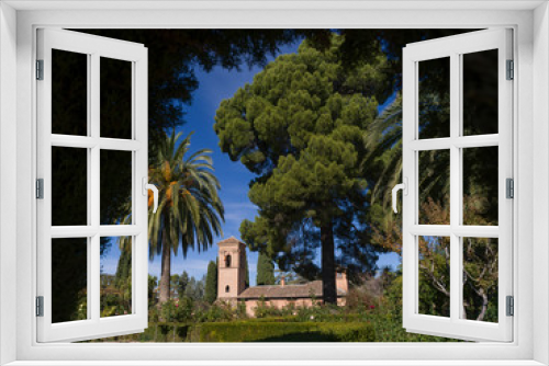 Fototapeta Naklejka Na Ścianę Okno 3D - Bell tower seen from garden of Alhambra Palace, Alhambra, Granada, Spain