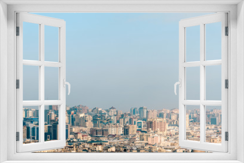 Fototapeta Naklejka Na Ścianę Okno 3D - Bright panoramic cityscape view of Baku, Azerbaijan. The downtown scenic view to old city and modern with tall skyscrapers near the coast of Caspian sea.