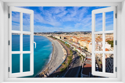 Fototapeta Naklejka Na Ścianę Okno 3D - Panoramic view on a winter morning with blue sky on the Nice waterfront, Promenade Des Anglais, and old town, from the castle garden