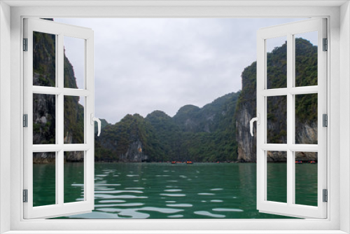 Fototapeta Naklejka Na Ścianę Okno 3D - Floating Fishing Village in Ha long Bay, Vietnam