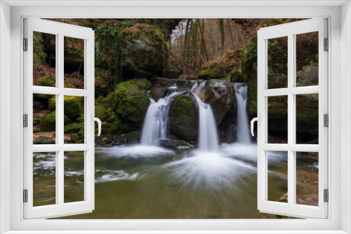 Fototapeta Naklejka Na Ścianę Okno 3D - The Schiessentümpel is a small and picturesque waterfall on the Black Ernz river. Mullerthal - Luxembourg’s Little Switzerland.