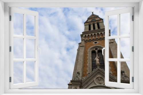 Fototapeta Naklejka Na Ścianę Okno 3D - Saint Francis of Assisi Church of Ferenc in Budapest with clouds on background