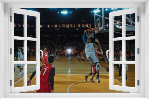 Basketball players on big professional arena during the game. Tense moment of the game. Celebration